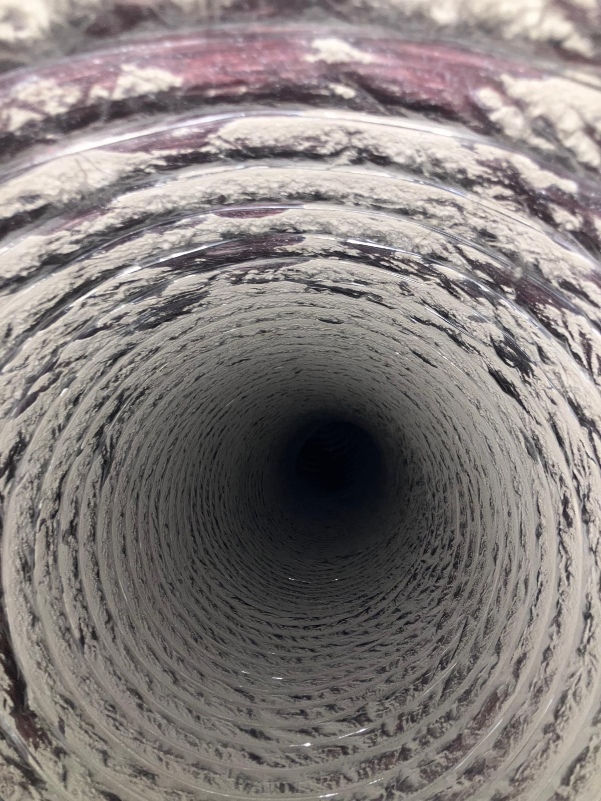 Dirty air duct before HVAC cleaning